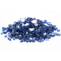 A pile of cobalt blue reflective fire glass shards.