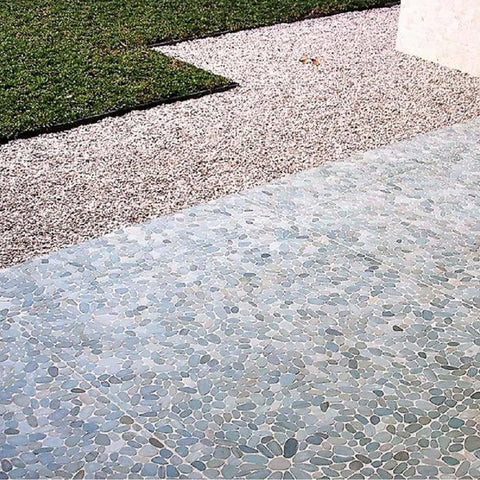 Detail view of flat sliced pebble mosaic in light grey, highlighting the smooth natural stone surface.